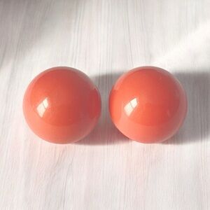 VINTAGE Orange Melon german plastic resin round dome clip on earrings.